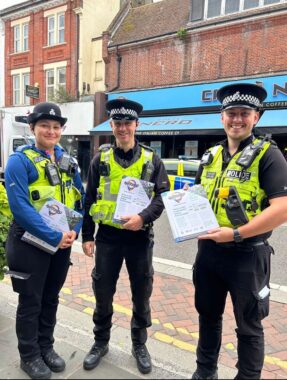 police officers stood on the high street